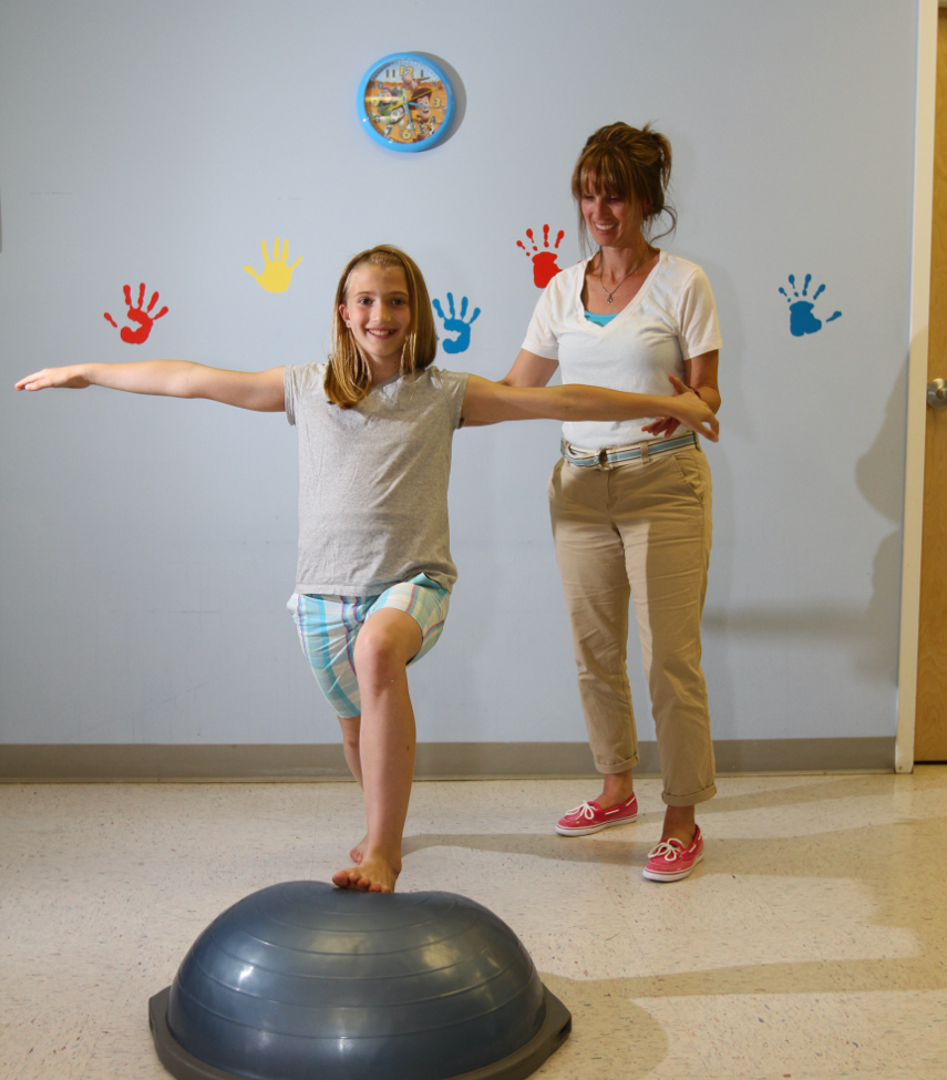 Therapist working with patient